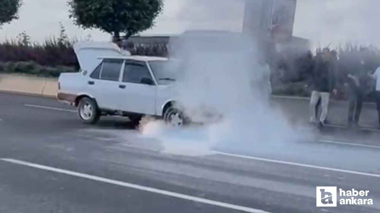 Yenimahalle'de alev alan aracı vatandaşlar yangın tüpleriyle söndürdü