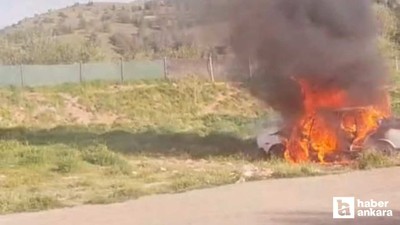 Çankaya'da boş arazide bir otomobil yanarak kullanılmaz hale geldi