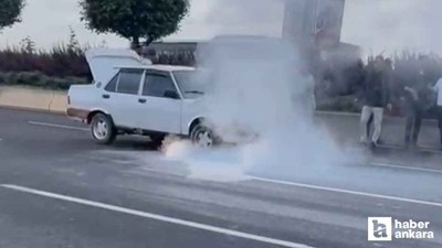 Yenimahalle'de alev alan aracı vatandaşlar yangın tüpleriyle söndürdü