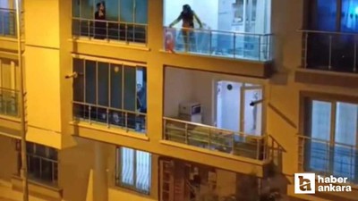 Keçiören'de genç kadın balkonundaki eşyaları yola fırlattı