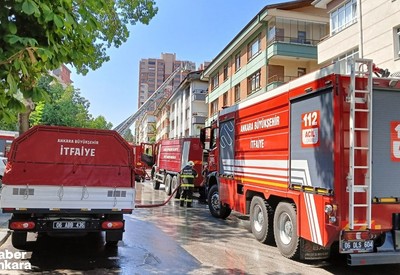 Ankara Çankaya'da evlerinde çıkan yangında mahsur kalan anne ile çocukları itfaiye ekiplerince kurtarıldı