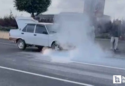 Yenimahalle'de alev alan aracı vatandaşlar yangın tüpleriyle söndürdü