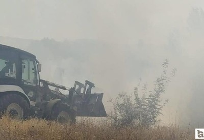 Güdül'de otluk alanda çıkan yangını itfaiye ekipleri söndürdü