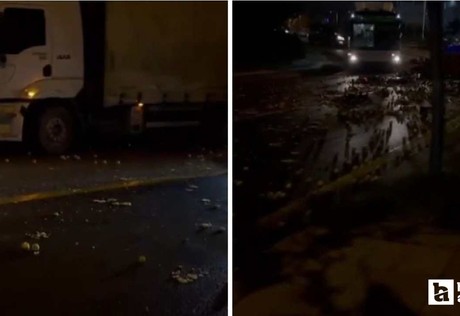 Yenimahalle'de kasası açılan kamyondaki elmalar yola saçıldı
