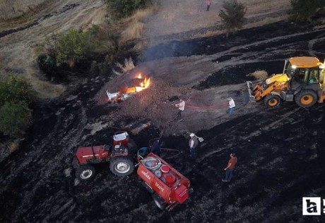 Güdül'de araçta başlayıp otluk alana sıçrayan yangın söndürüldü