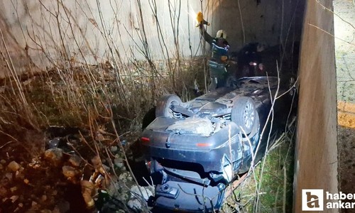 Beypazarı'nda otomobil 5 metre yükseklikten bahçeye devrildi: 2 yaralı