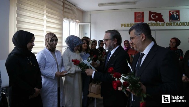 Pursaklar'da öğretmenlere kitap ve gül hediye edildi